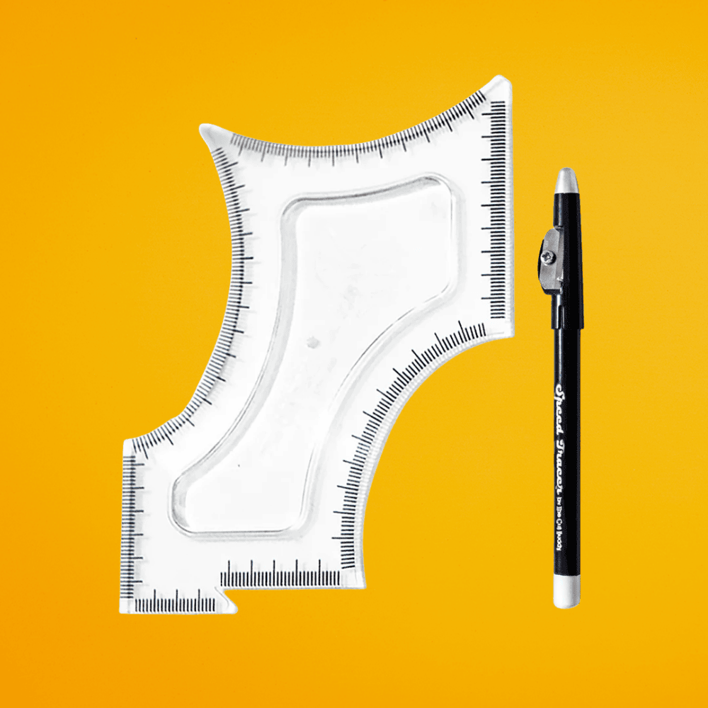 Clear plastic beard shaping template tool and white marking pencil for symmetrical facial hair grooming on a yellow background.