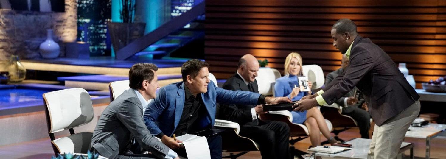 the cut buddy on shark tank with the sharks mark cuban, lori, daymond john, mr wonderful, and robert