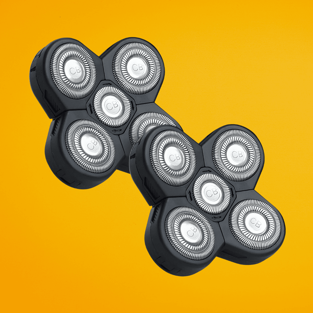 A value 2 pack of replacement 5-blade rotary shaving heads for The Cut Buddy Bald Buddy shaver, featuring flexible contour blades for wet or dry use.