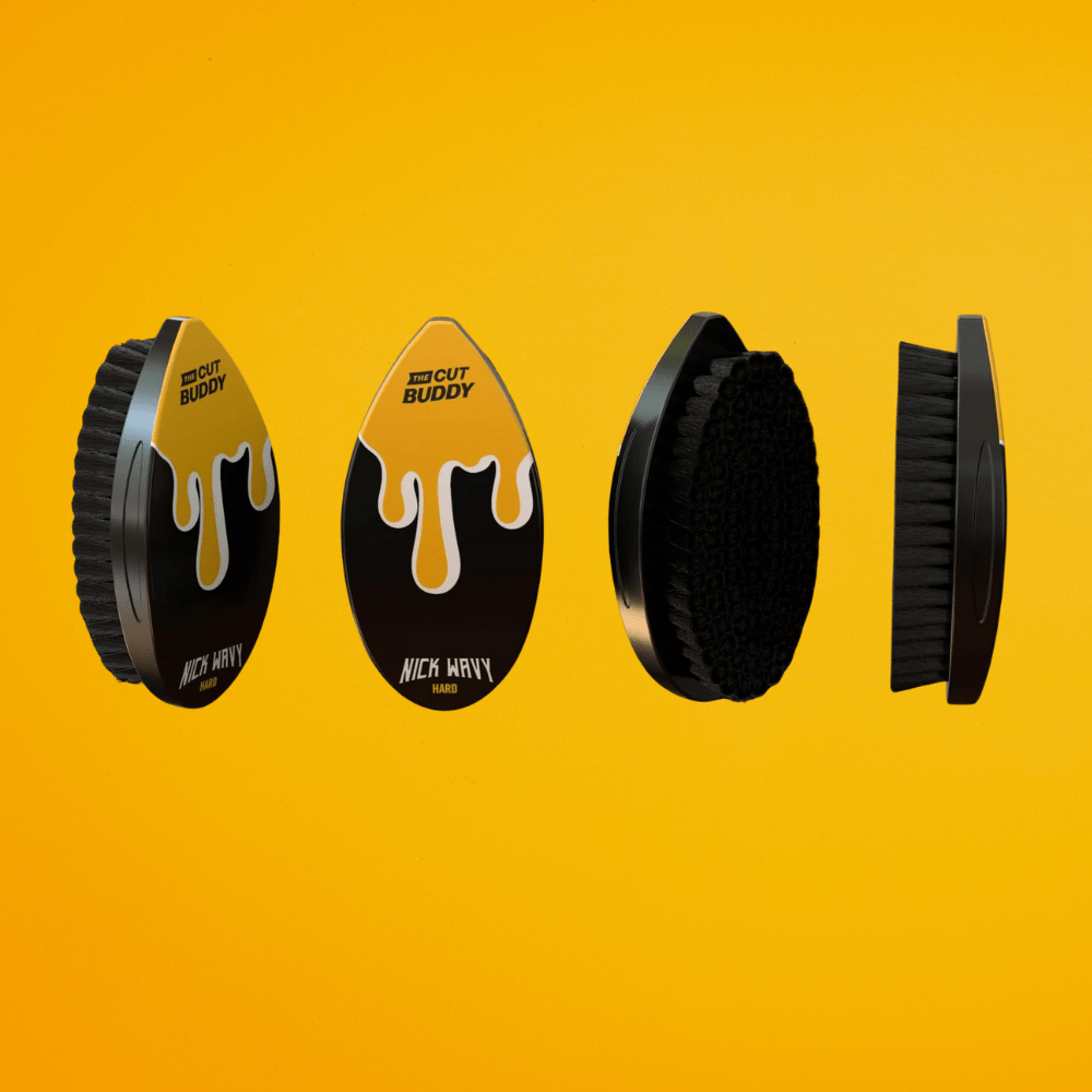 Four-view profile of the black and yellow Nick Wavy Hard Brush showcasing the ergonomic finger grooves, drip design, and firm bristles for wolfing.