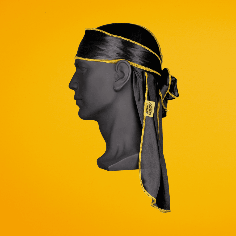 Premium black silk durag with yellow stitching by The Cut Buddy for 360 wave compression.