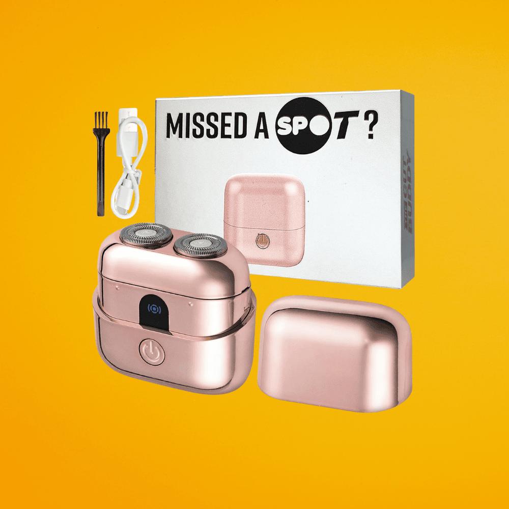 Compact travel-ready rotary shaver in rose gold, featuring a portable dual-head design for quick touch-ups.