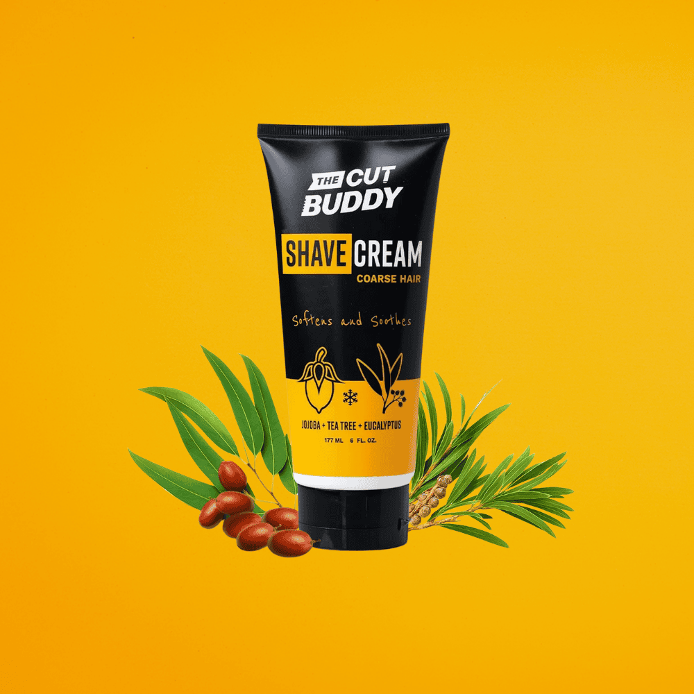 The Cut Buddy Shave Cream for coarse hair featuring natural jojoba, tea tree, and eucalyptus ingredients for softening and soothing skin.