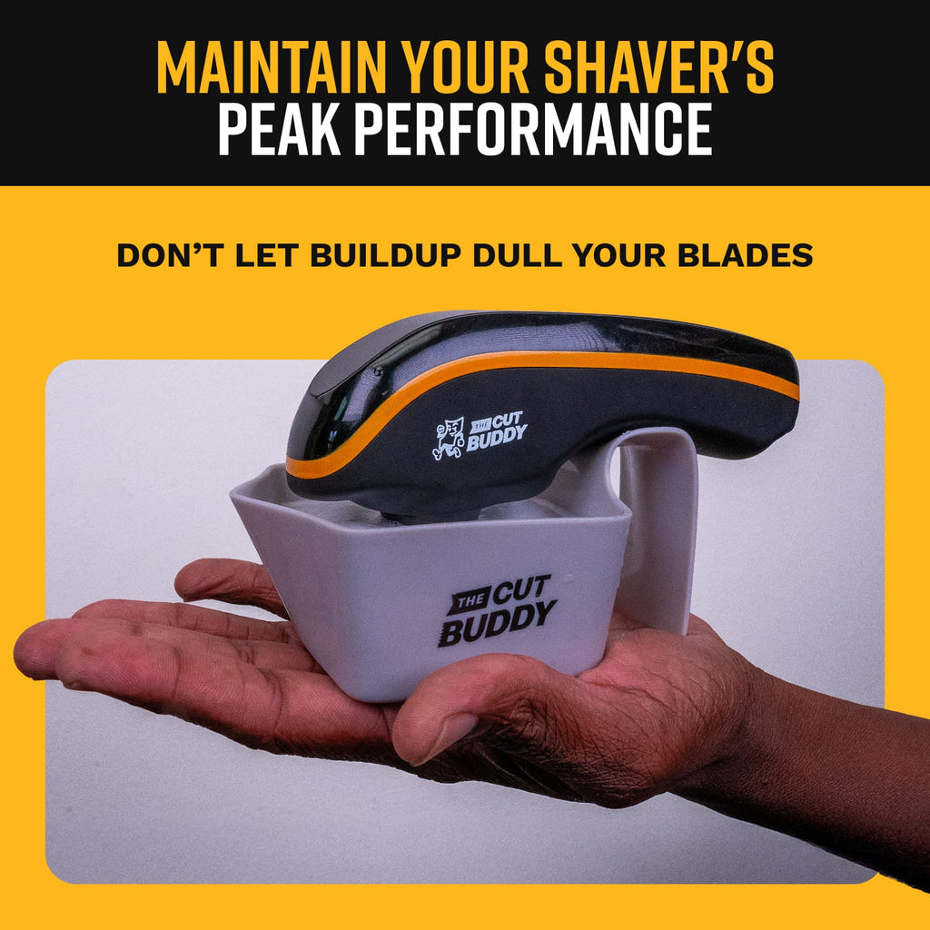 Close-up of a black and yellow electric razor showing a blue digital battery percentage indicator while connected to a USB power cable.